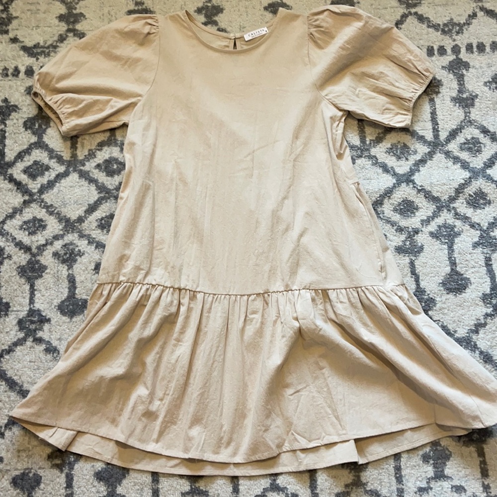Beige dress.